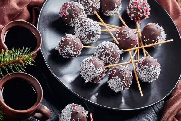 festive chocolate cake pops on a plate