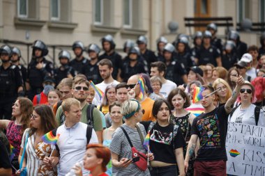 People attend the Equality March, organized by the LGBT community clipart