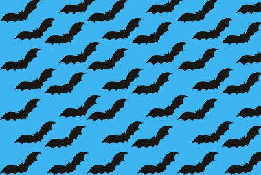 Mavi arka plan üzerinde kağıt yarasalar desen. Cadılar Bayramı kavramı.