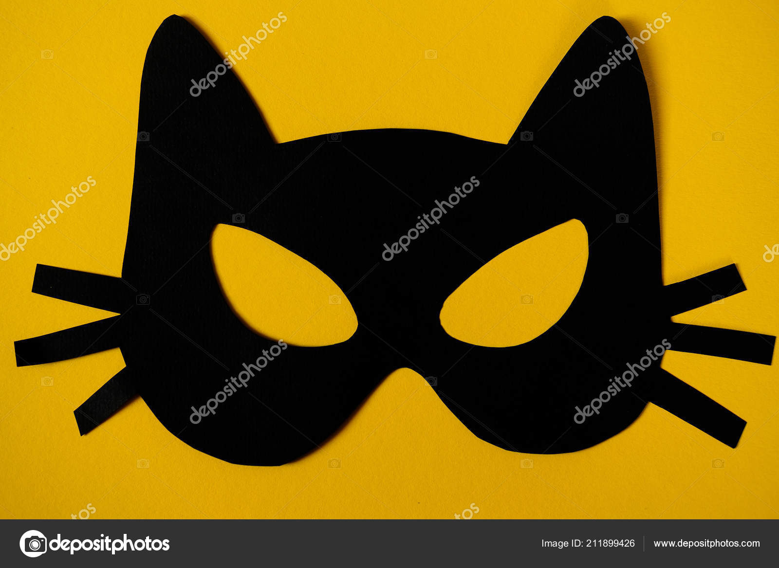 Paper Cat Mask Yellow Background Halloween Carnival Masquerade Concept  Stock Photo by ©skvalval 211899426