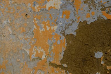 Üzerinde duvar eski soyulması boya. Yüzey eski sarı soyma ile doku detay ve ve kahverengi boya. Soyulmuş alçı duvar boya gevreği düşme ile kirli. Arka plan
