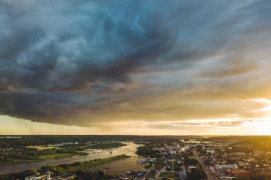 Sunmer sunset. Aerial view of Kaunas city center. Kaunas is the second-largest city in Lithuania and has historically been a leading centre of economic, academic, and cultural clipart