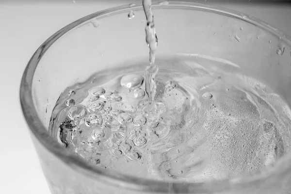 Pouring Water Bottle Glass White Background — Stock Photo, Image