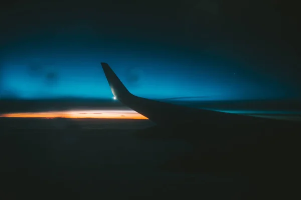 Dramatic sunrise, view from the airplane — Stock Photo, Image