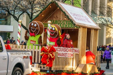 Vancouver, Kanada - 2 Aralık 2018: Vancouver, Kanada'da her yıl düzenlenen Noel Baba Geçit Törenine katılan noel pazarı