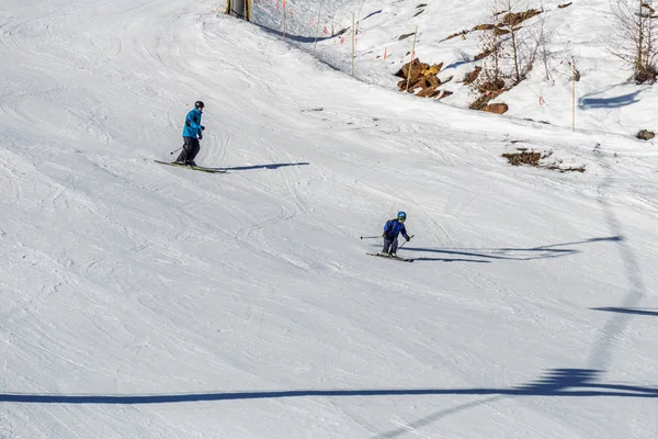 KIMBERLEY, CANADA - MARCH 22, 2019: Mountain Resort view early spring people skiing. — Stock Photo, Image