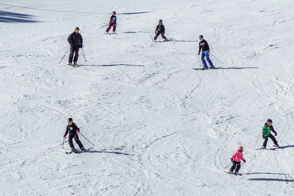 KIMBERLEY, CANADA - MARCH 22, 2019: Mountain Resort view early spring people skiing. — Stock Photo, Image
