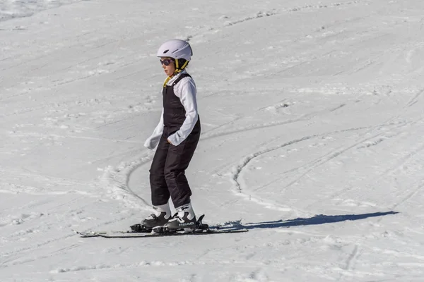 KIMBERLEY, CANADA - MARCH 22, 2019: Mountain Resort view early spring child skiing. — Stock Photo, Image