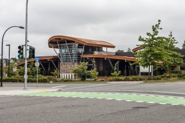 ABBOTSFORD, CANADA - MAY 29, 2019: sprot center in town and street view in spring. clipart