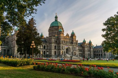 VICTORIA, CANADA - JULY 13, 2019: parliament building in the city center of Victoria historical and travel destination. clipart