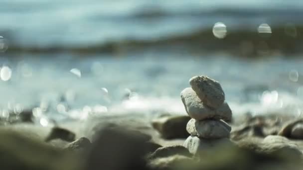 Stack of stones and Sea Splash — Stock Video