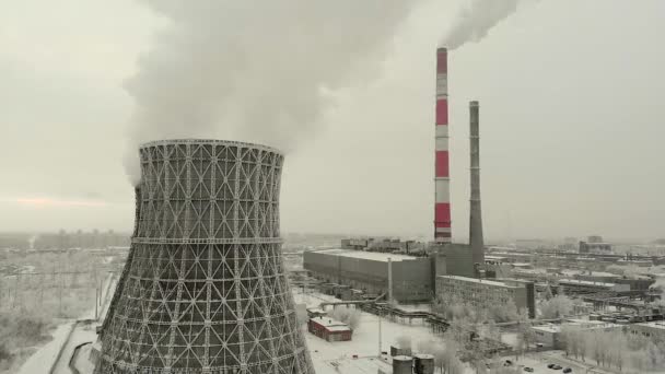 Steam, smoke from pipes at a thermal power station. Aerial. — Stock Video