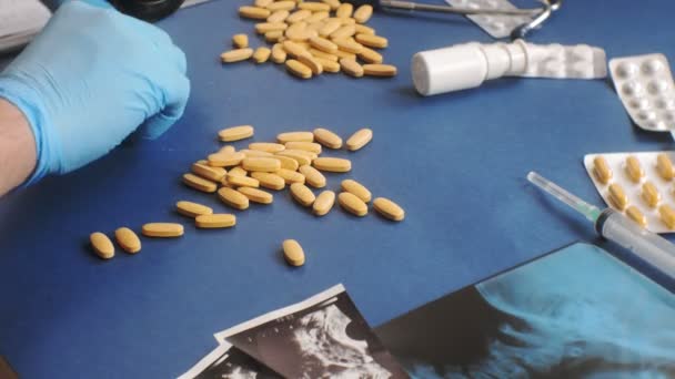 Doctors desk, top view on blue background, medicine concept — Stock Video