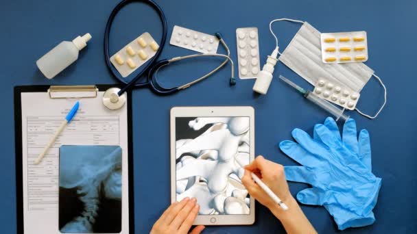 Doctors desk, top view on blue background, medicine concept — Stock Video