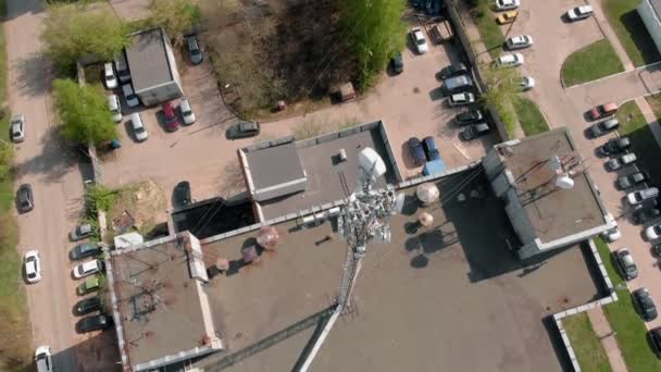 Cell Tower. Urban environment, residential buildings. Aerial shooting from the drone — Stock Video