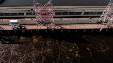 nehir üzerinde hidro elektrik santrali, helikopter ateş