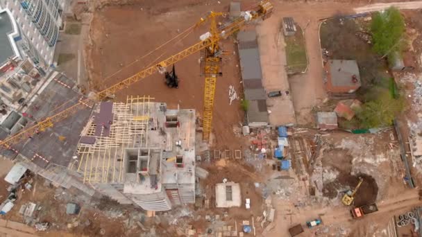 Construction of a residential high-rise building. Aerial shooting from the drone — Stock Video