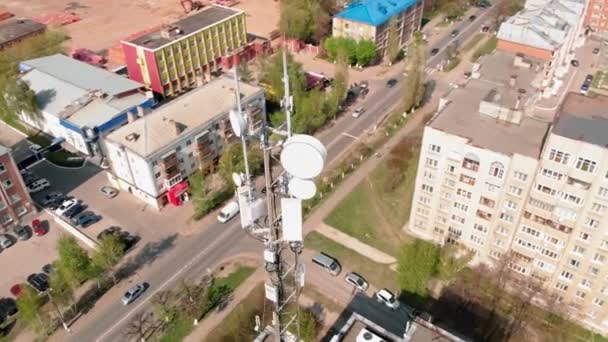 Cell Tower. Urban environment, residential buildings. Aerial shooting from the drone — Stock Video