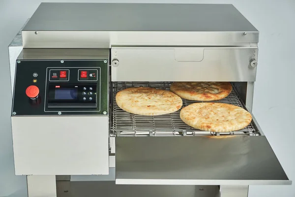 Industrial electric pizza oven for catering. Professional kitchen equipment