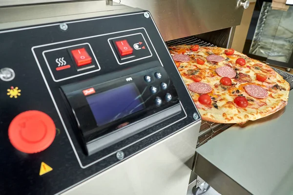 Industrial electric pizza oven for catering. Professional kitchen equipment