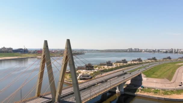 Road bridge across the river. Urban environment — Stock Video