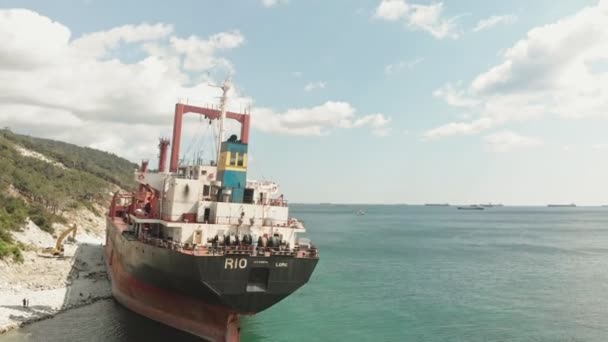 Cargo Ship aground at sea. — Stock Video