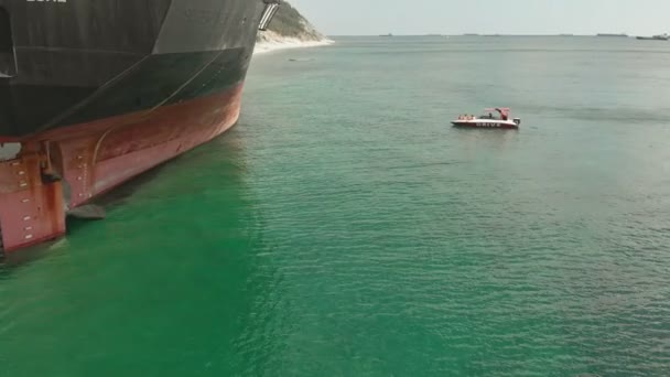 Cargo Ship aground at sea. — Stock Video