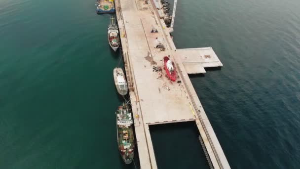 Dock for yachts and ships at sea. Aerial shot — Stock Video