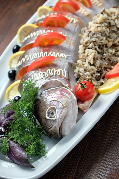Stuffed fish with vegetables and rice. catering menu — Stock Photo, Image