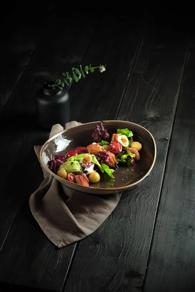 Caesar salad with salmon . catering menu Stock Image