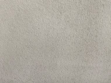 Kaba gri duvar yüzeyinin çok az beton dokusu var. Tarafsız arka plan tasarım modelleri, mimari projeler, inşaat malzemeleri ve modern soyut dokular için mükemmeldir..