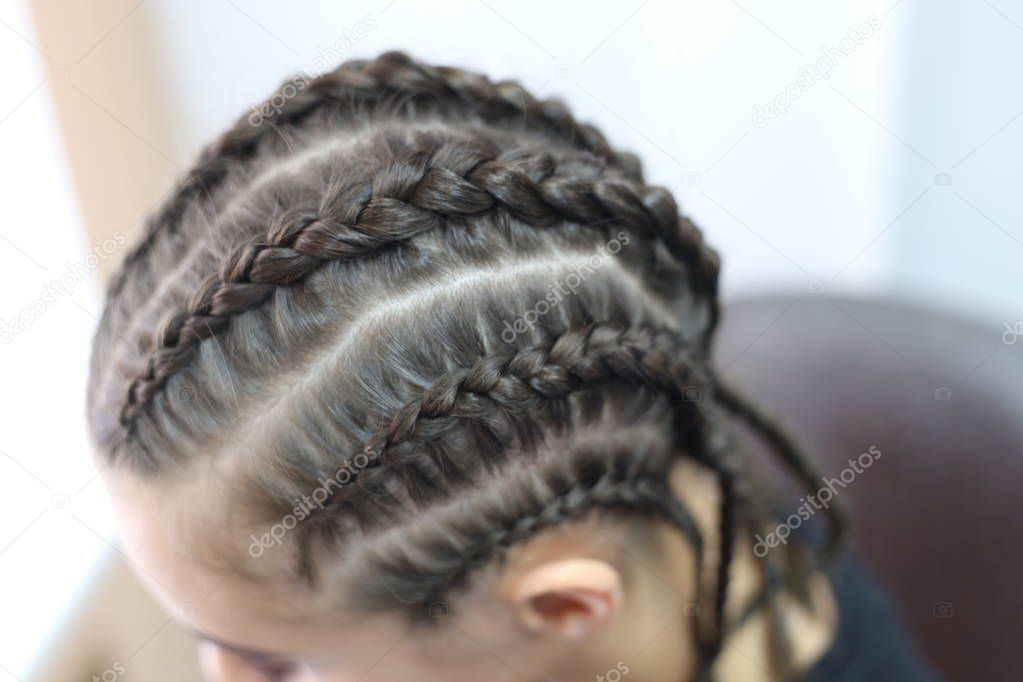 texture of hair on head of girl or man on white background close-up