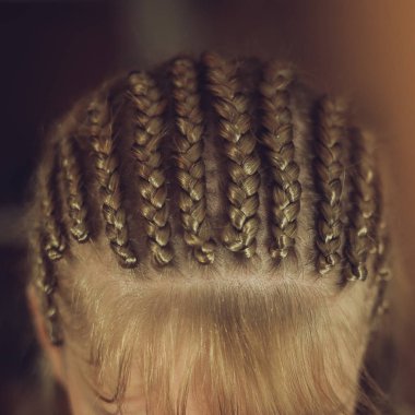 thick braids close up in African style on the girls head, bangs, hairstyle, hair braided clipart