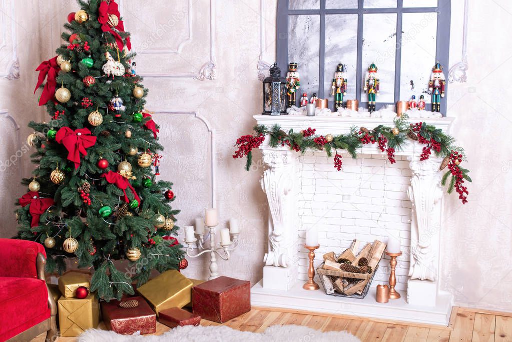 Beautiful holiday decorated room with Christmas tree, fireplace and with presents. Cozy winter scene. White interior. Christmas Nutcracker