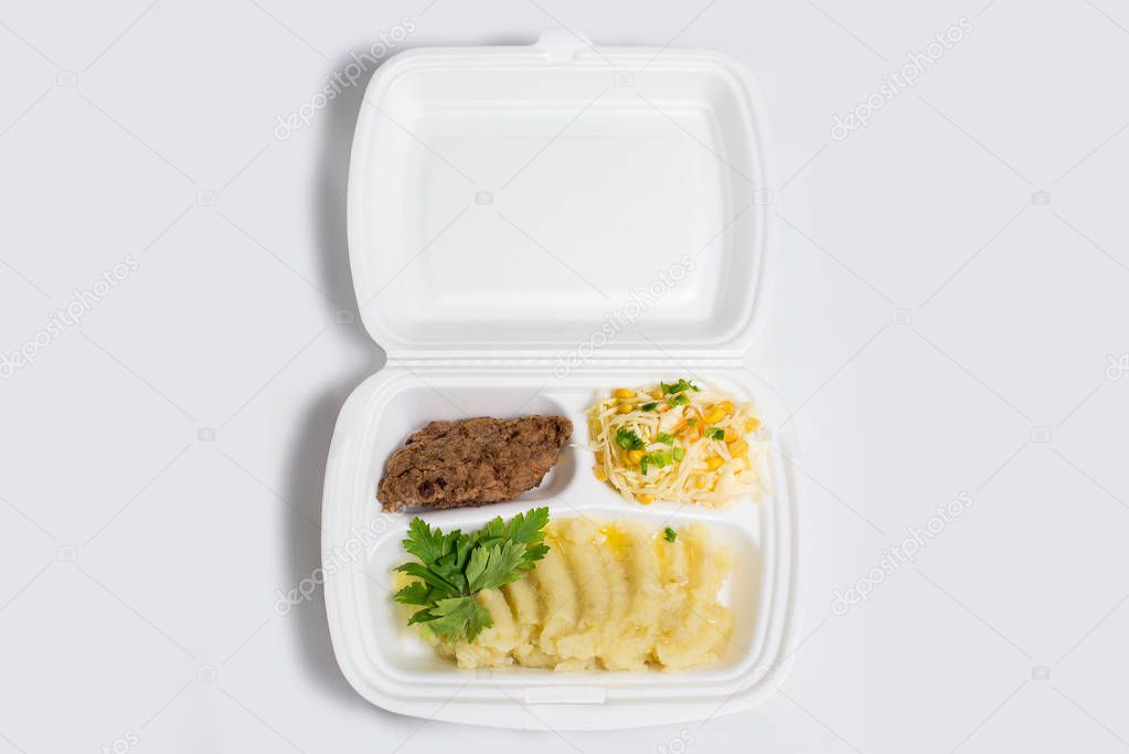 lunch box set. Disposable plastic lunch box. A white food box, lunch, fast food, isolated on white background