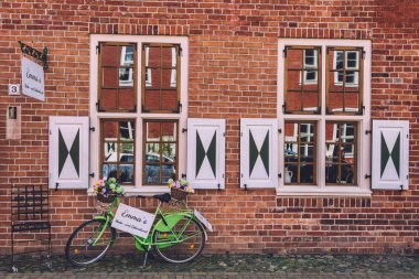 Brick Wall and Green Bicycle on Dutch District in Potsdam clipart