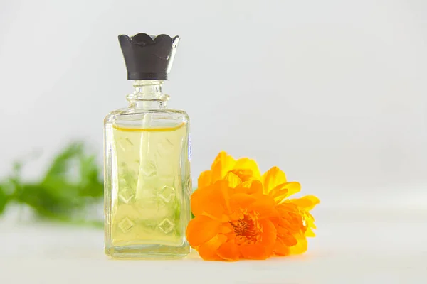 Essence Flowers Table Beautiful Glass Bottle — Stock Photo, Image