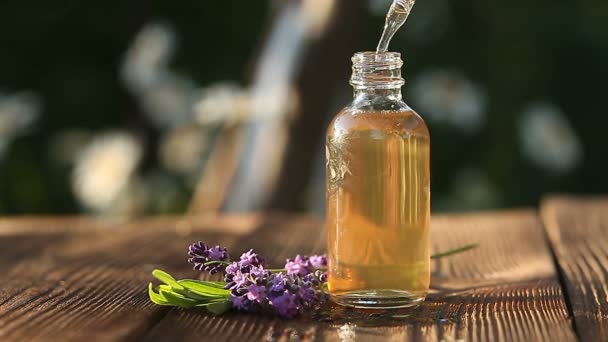 Lavender Essential Oil Beautiful Bottle Table — Stock Video