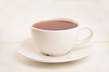 Porselen fincan yeşil çay bir tablo ile