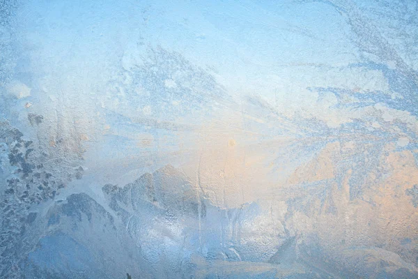 Hermosos patrones de textura de invierno de heladas en la ventana —  Fotos de Stock