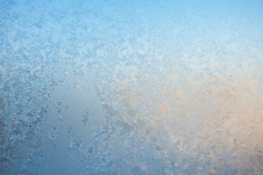 beautiful winter texture patterns of frost on window clipart