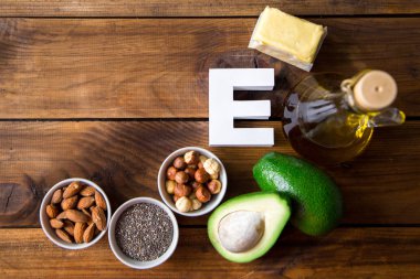 Doğal ürünler zengin E vitamini ve mektup E. helthcare kavram