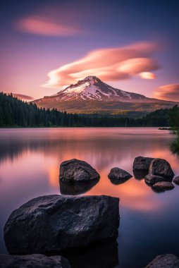 Lenticular clouds at sunset over Mt Hood and Trillium Lake, Oregon clipart