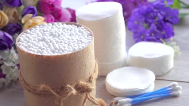 Cotton buds and a stack of cotton pads on the table,close up — Stock Video