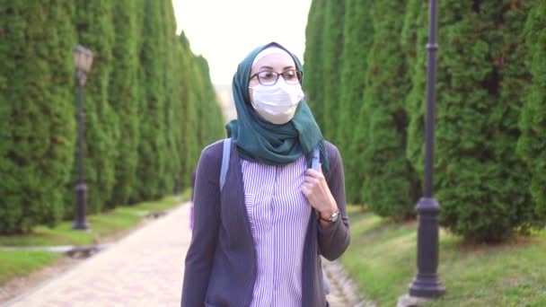 Muslim Woman Scarf Protective Medical Mask Her Face Goes Park — Stock Video