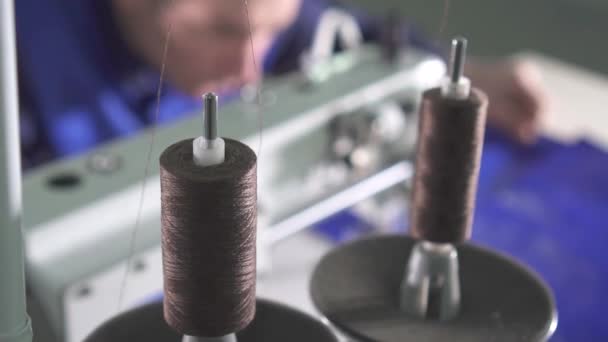 Close-up of the thread coil on the sewing machine while working — Stock Video