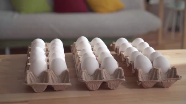Chicken eggs in a cardboard box — Stock Video
