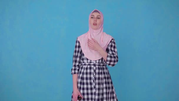 Young Muslim woman having trouble breathing runny nose,uses nose spray — Stock Video