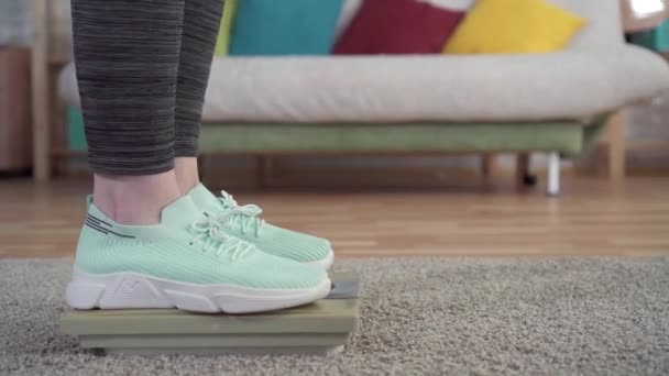 Concept idea weight control feet close-up on the scales — Stock Video