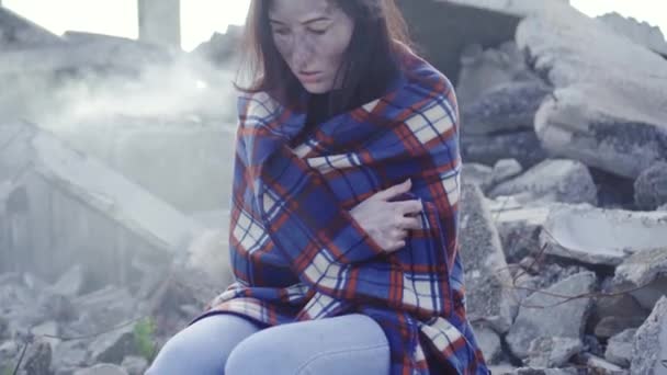 Portrait of dirty face woman survivor after fire or natural disaster looking at camera — Stock Video